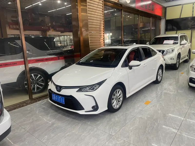 Toyota Corolla Dual Engine 1.8L E-CVT Elite Edition, 2021 — фото 1